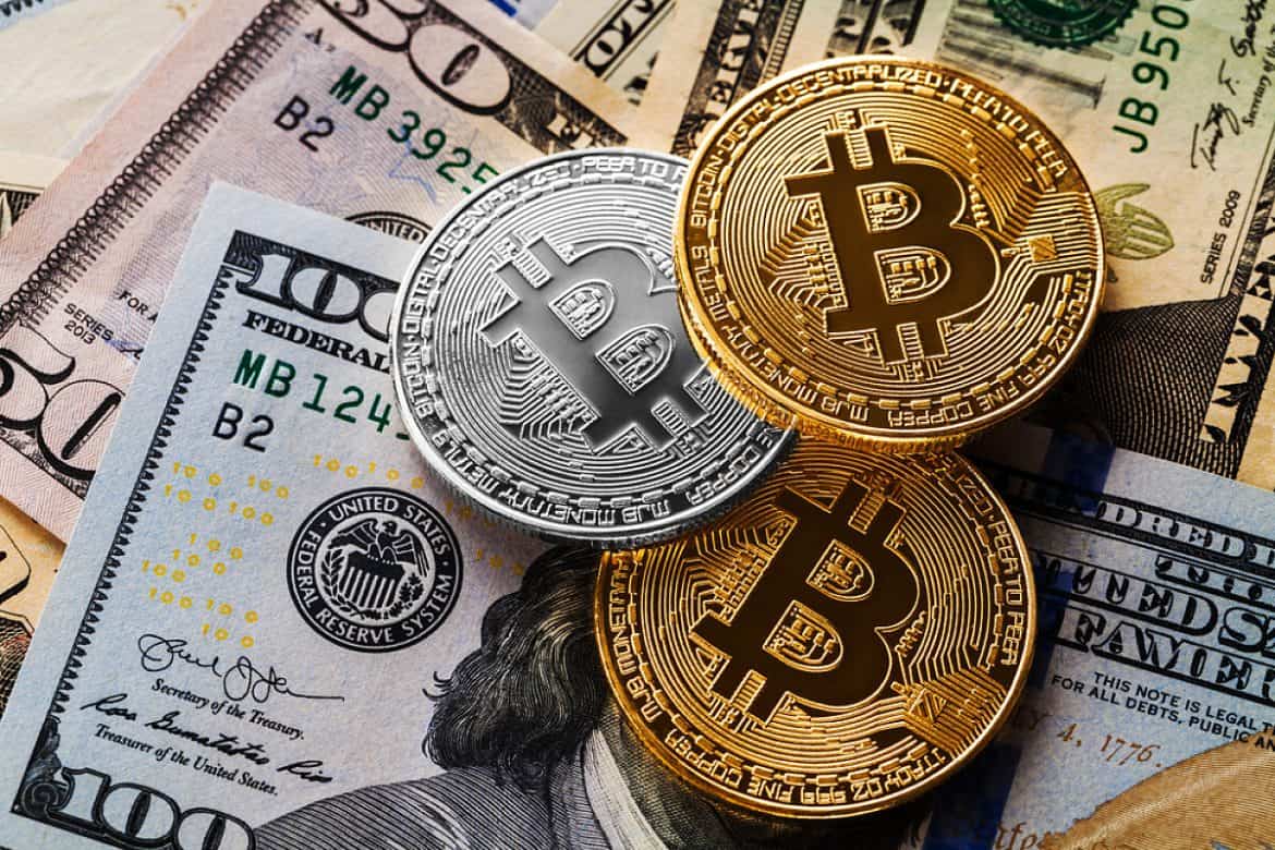 البيتكوين يهبط إلى 86 ألف دولار والذهب يتجاوز 5000 دولار